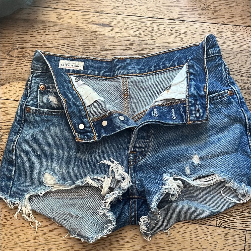 Levi's 501s  Blue Distressed Jean Shorts waist 25